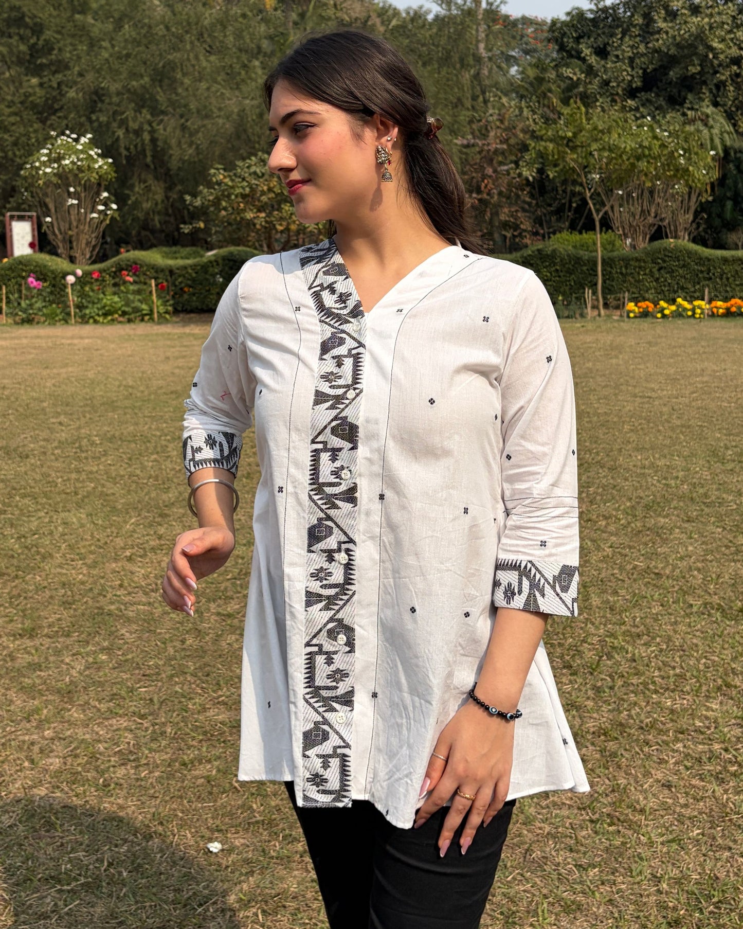 A line shirt made in Jaamdani fabric.