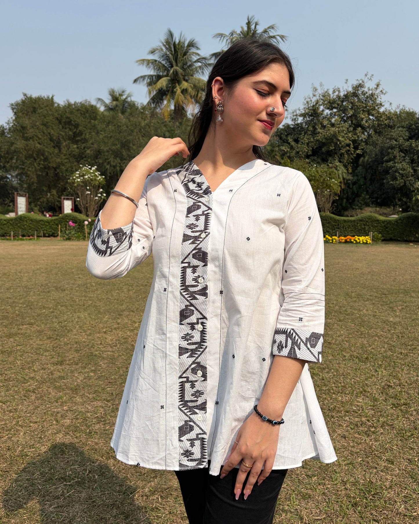 A line shirt made in Jaamdani fabric. 