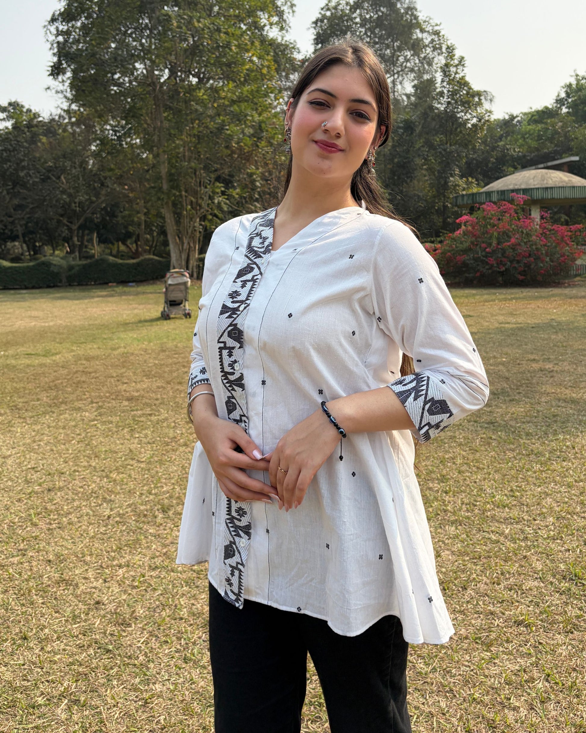 A line shirt made in Jaamdani fabric. 