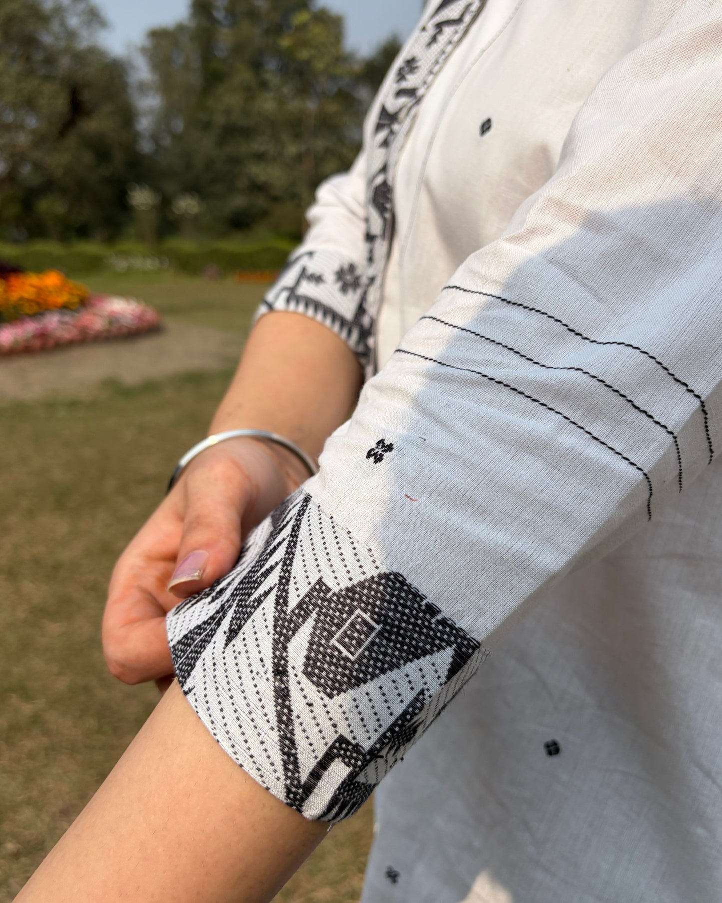 A line shirt made in Jaamdani fabric. 