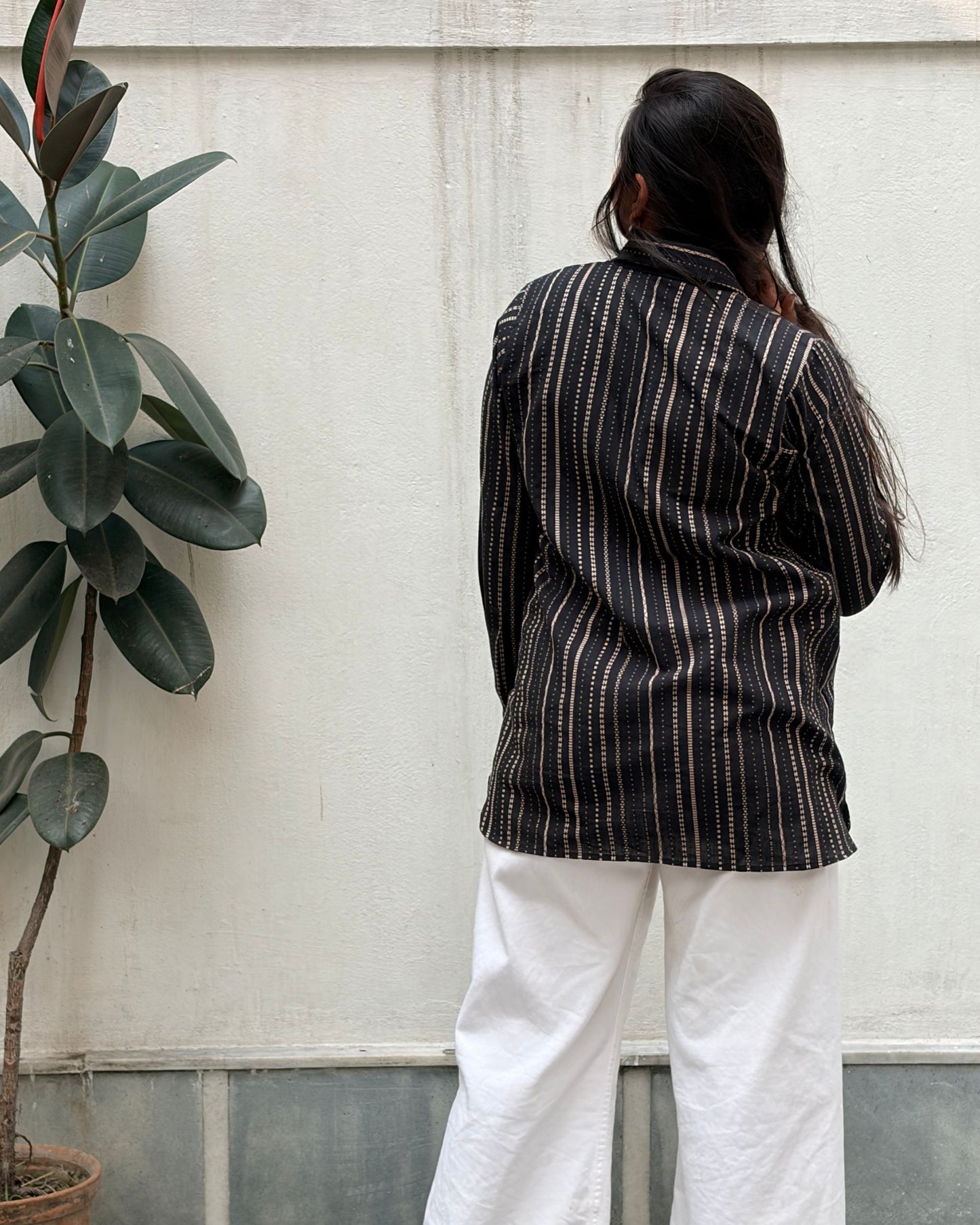 black shirt with colourful applique