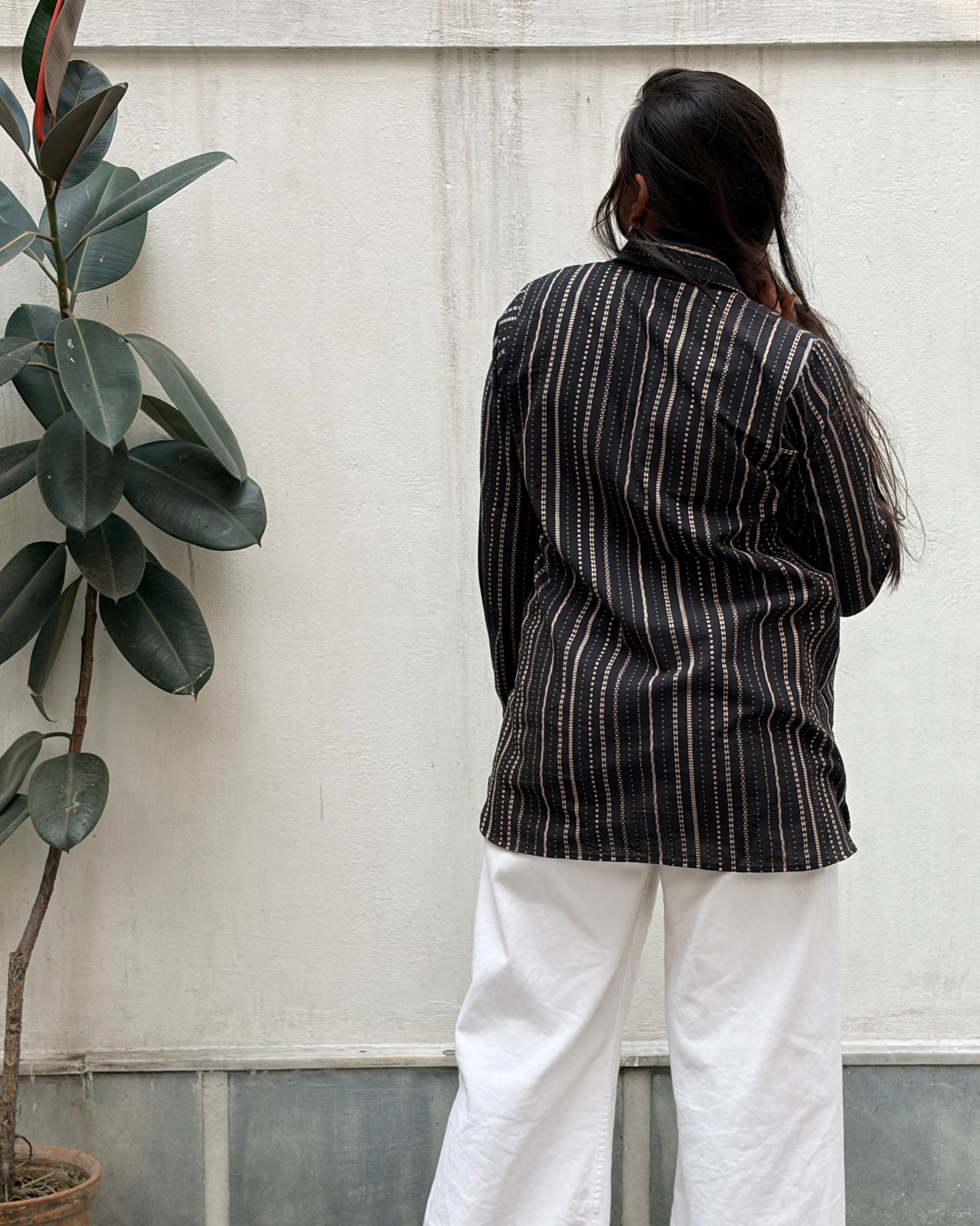 black shirt with colourful applique