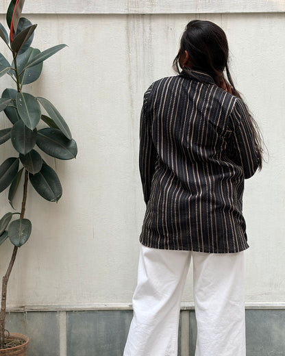 black shirt with colourful applique